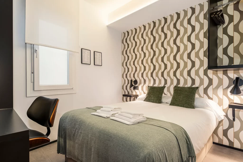 Habitación de 9 m² en Chamberí completamente equipada con cocina americana, lavadora, secadora, climatización y wifi.